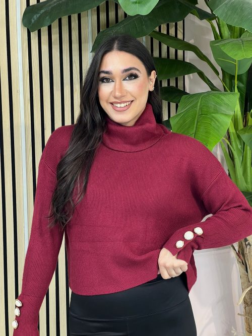 Lupetto bottoni manica